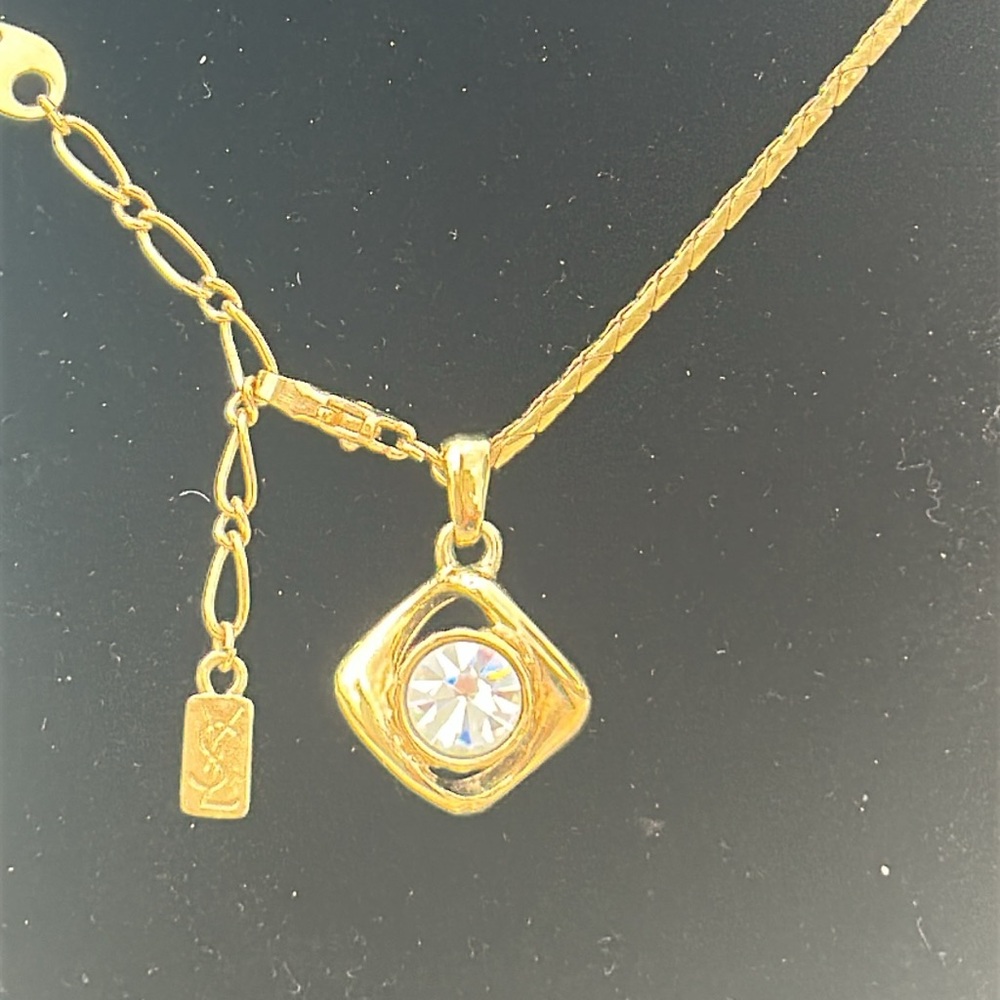 Yves Saint Laurent (YSL) pendant necklace in gold: